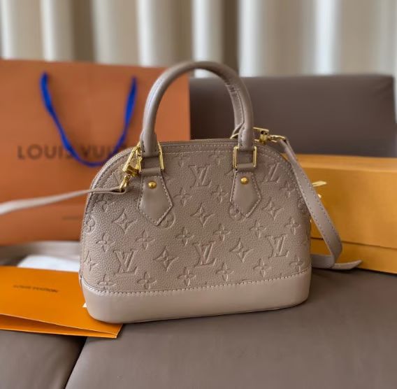 WhatsApp Image 2025-09-08 at 6.17.04 PM Louis Vuitton Alma Khaki Handbag